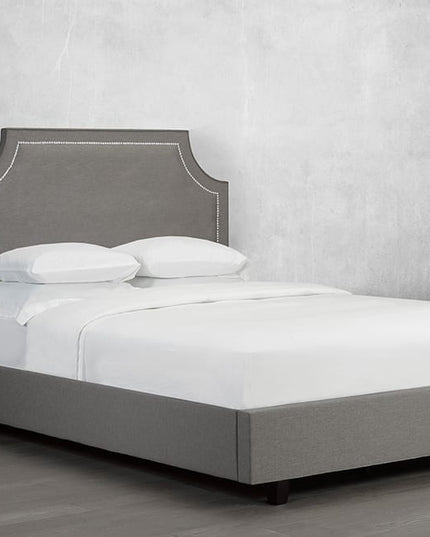 Custom Curved Corner Bed with Nailhead Trim